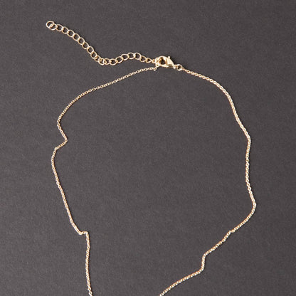 Rainbow Moonstone Crystal Point Necklace by Tiny Rituals