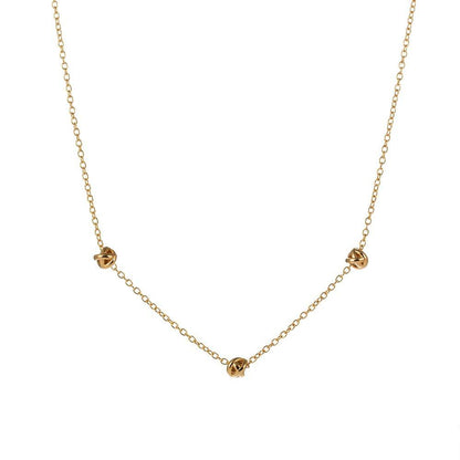 Gold Love Knot Necklace by Hollywood Sensation®